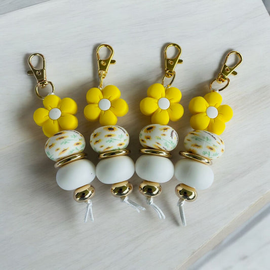 Porte-clés en silicone fleur jaune/tournesol