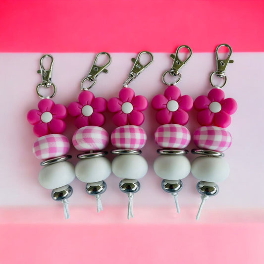 Porte-clés en silicone à motif de fleur rose